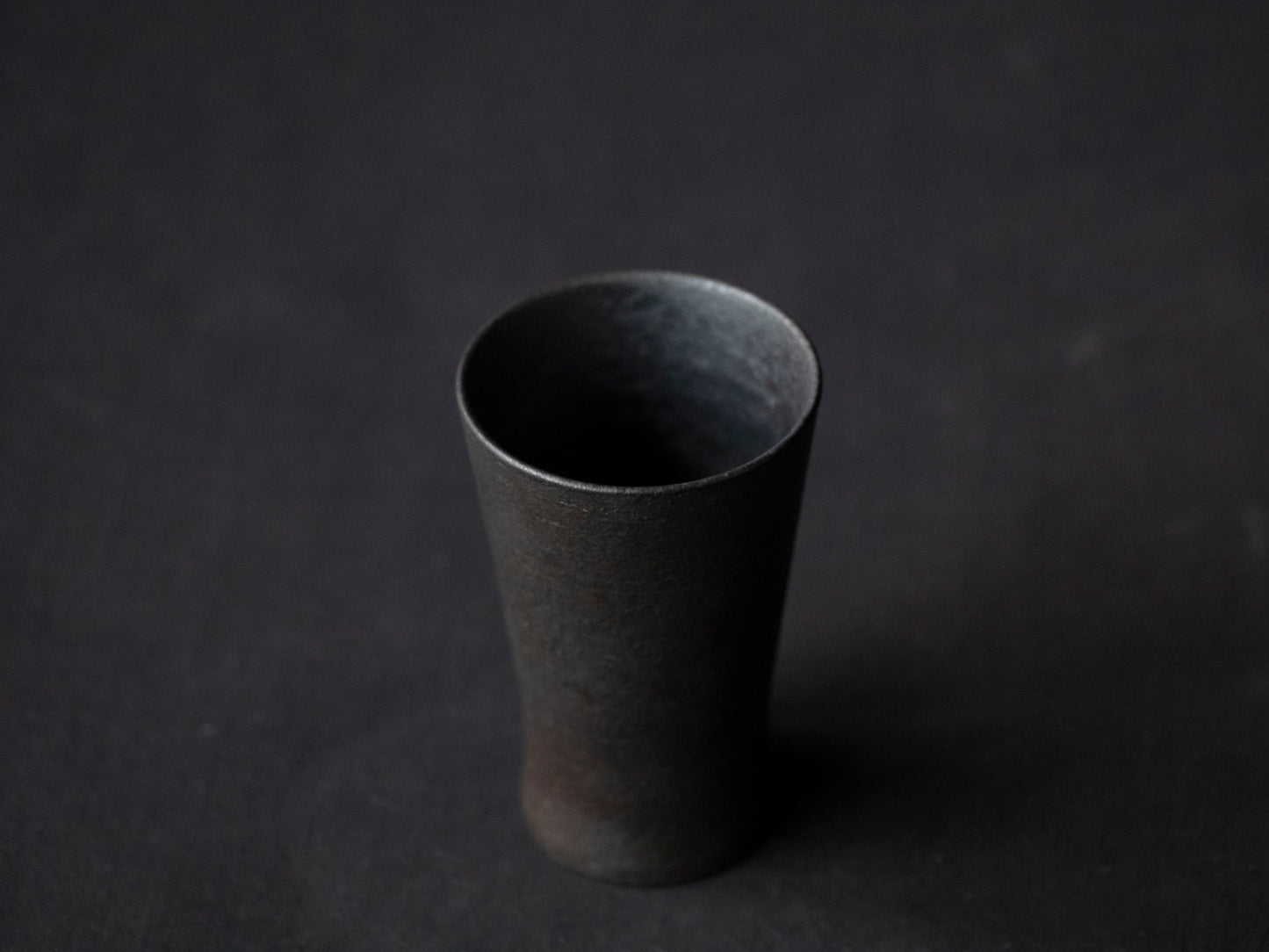 black ceramic cup seen from above