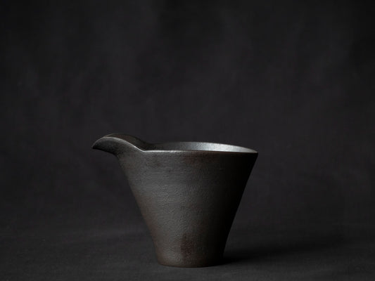 side view of black ceramic carafe